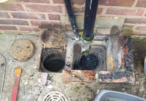 blockage-in-outdoor-drain-from-downpipe-debris