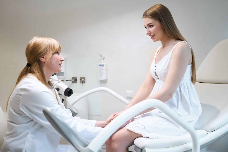 Beautiful young woman at a gynecologists appointment at medical center