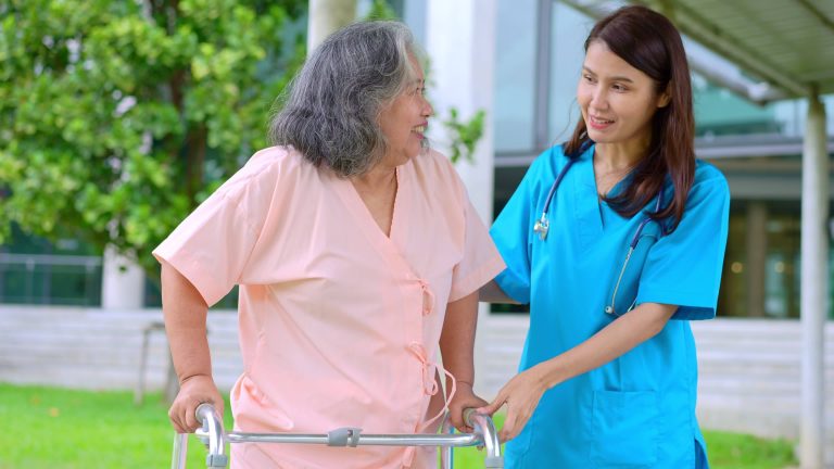 asian-careful-caregiver-or-nurse-taking-care-of-the-elderly-asian-patient-in-a-wheelchair-concept-of-happy-retirement-with-care-from-a-caregiver-and-savings-and-senior-health-insurance-elderly-care-vid